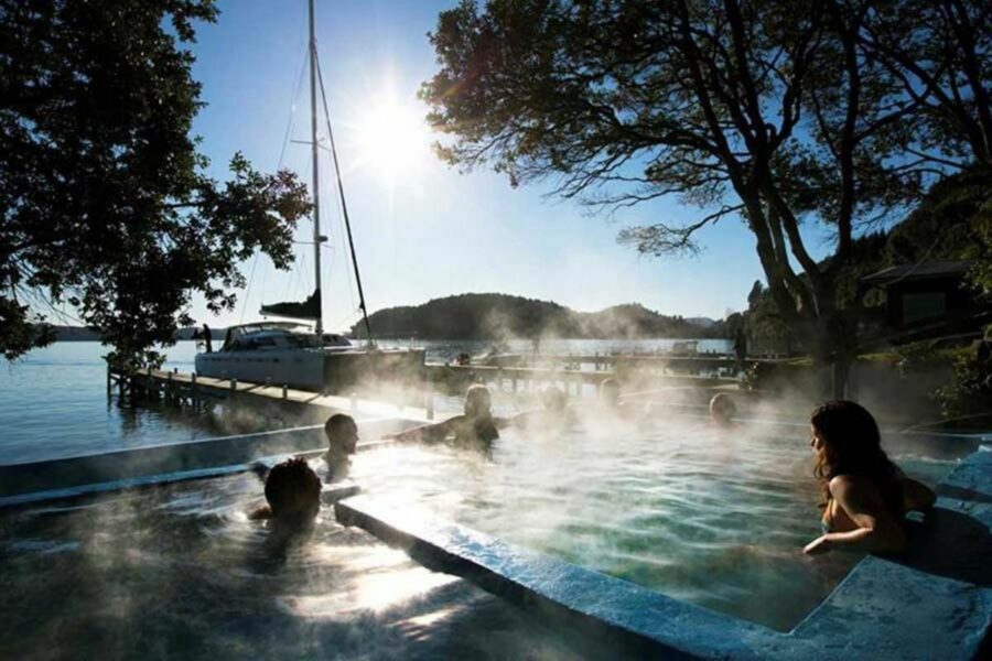 Private hidden hot spring with Pure Cruises Lake Rotoiti luxury experiences in New Zealand